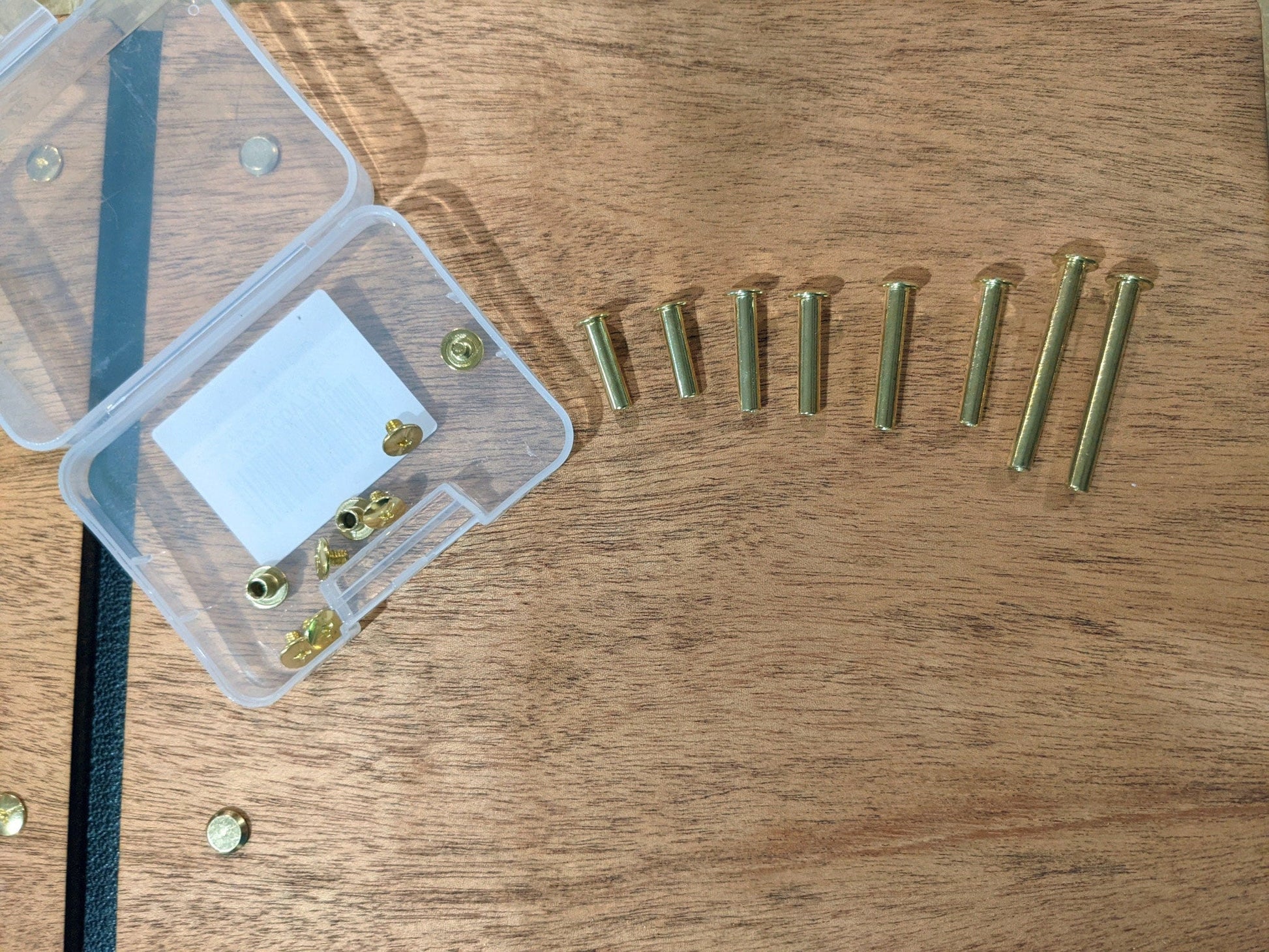 Extra screws and binding posts for guest books